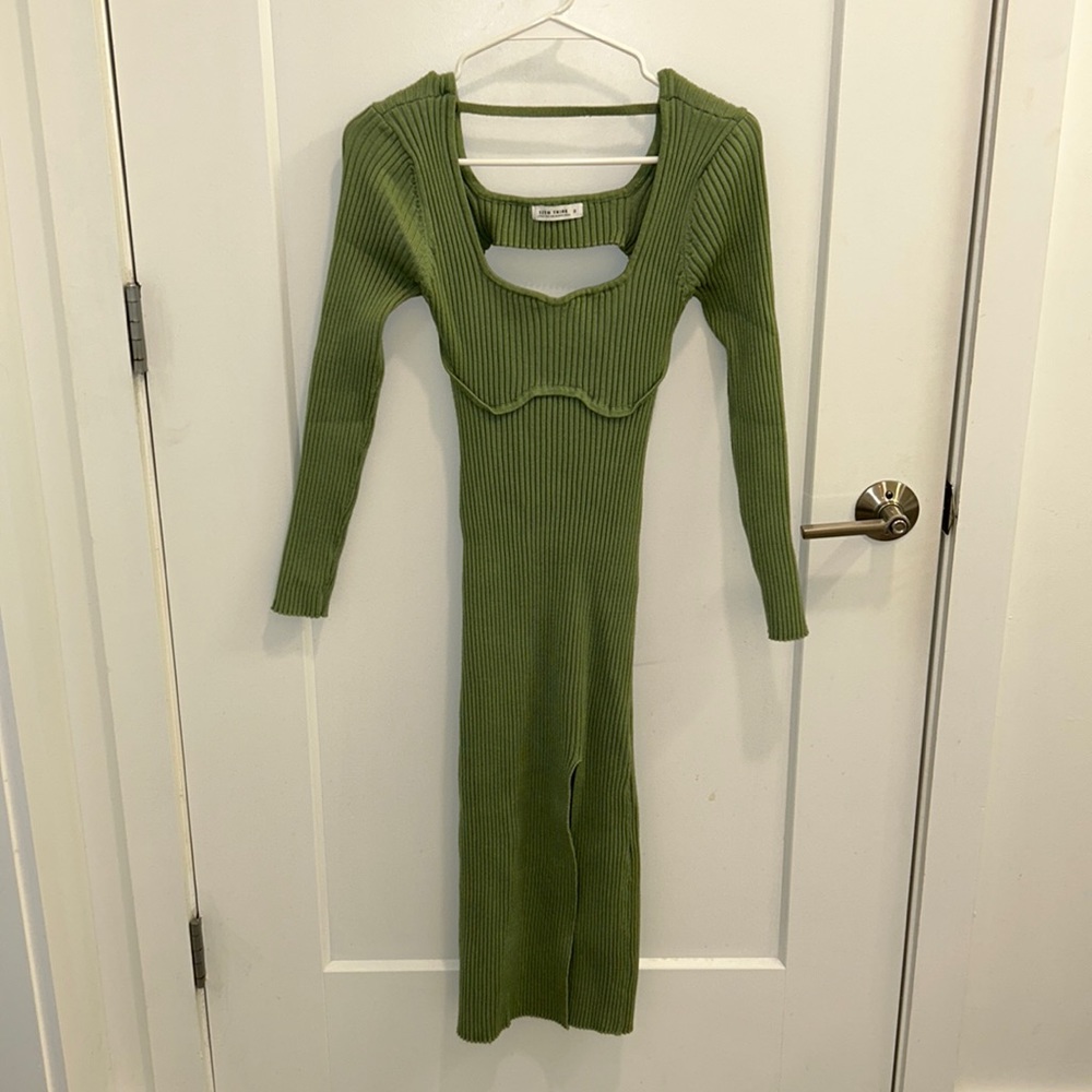 Sage green ribbed, long sleeve, backless midi dress with side slit.